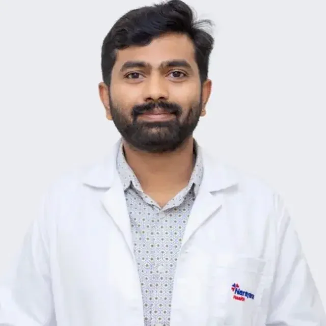 Dr. Akash J