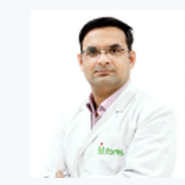 Dr. Dharmender Malik